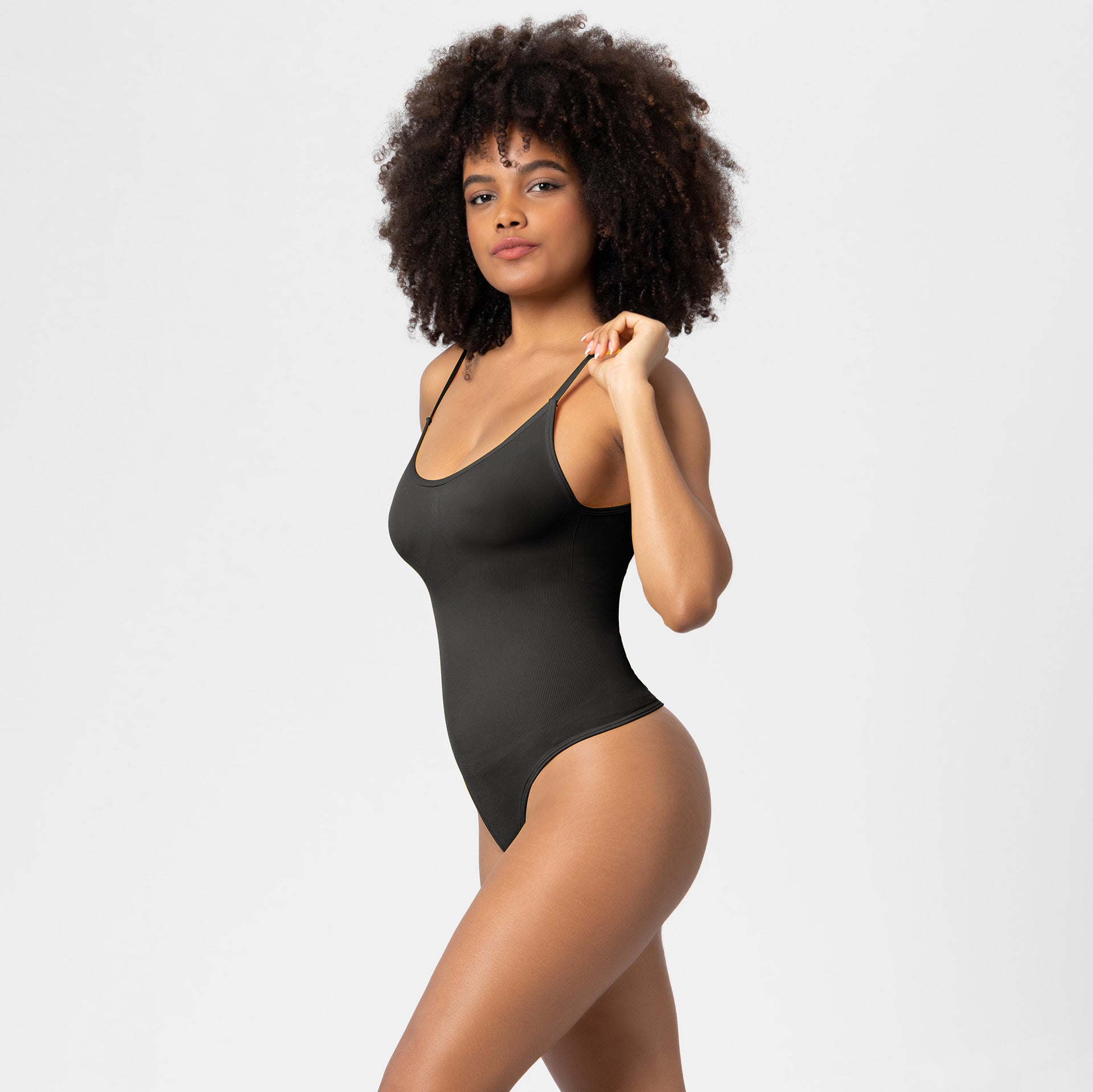 Focuses on "Premium Shapewear Bodysuit" and "Tummy Control"