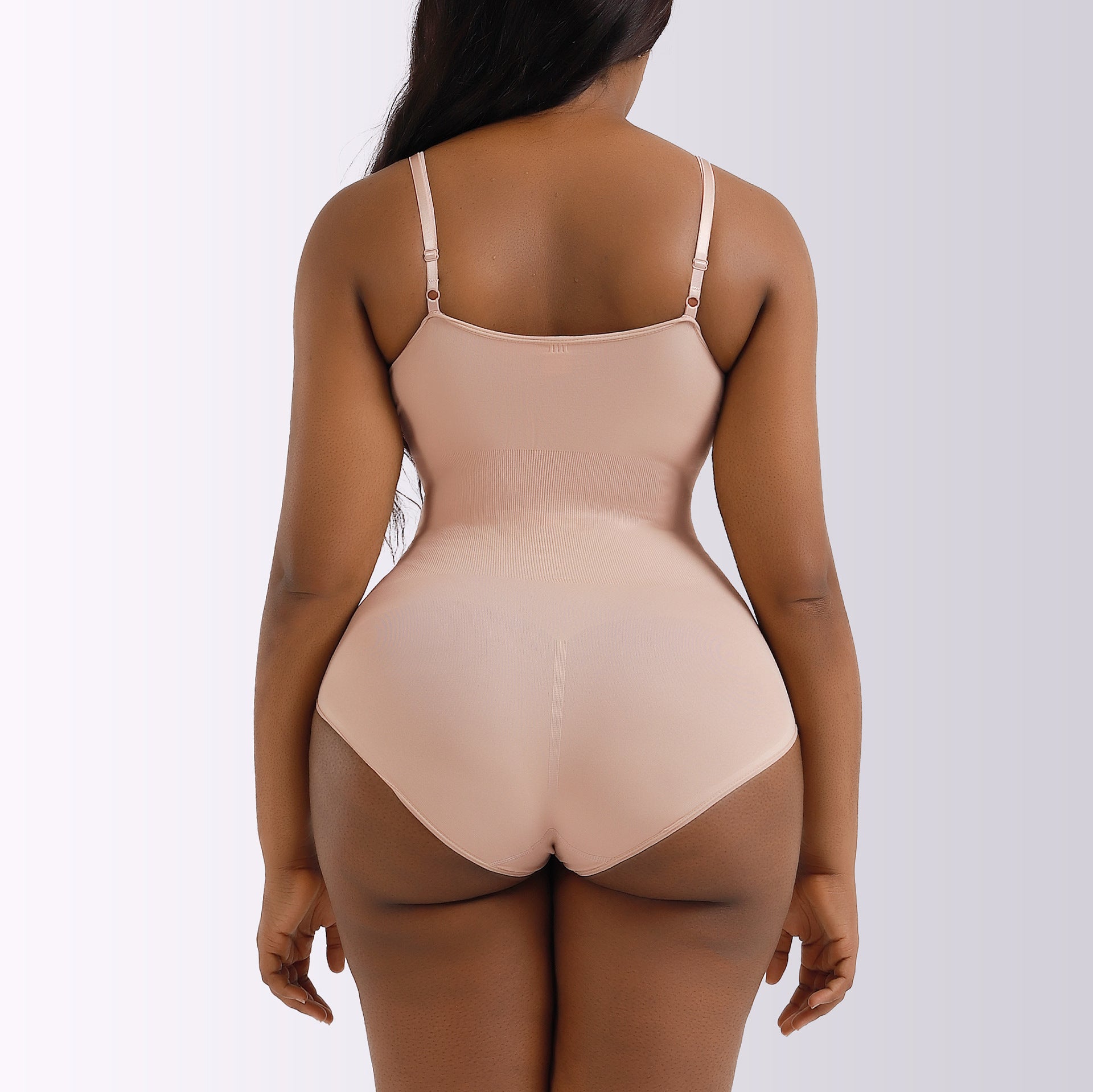 Focuses on "Premium Shapewear Bodysuit" and "Tummy Control"