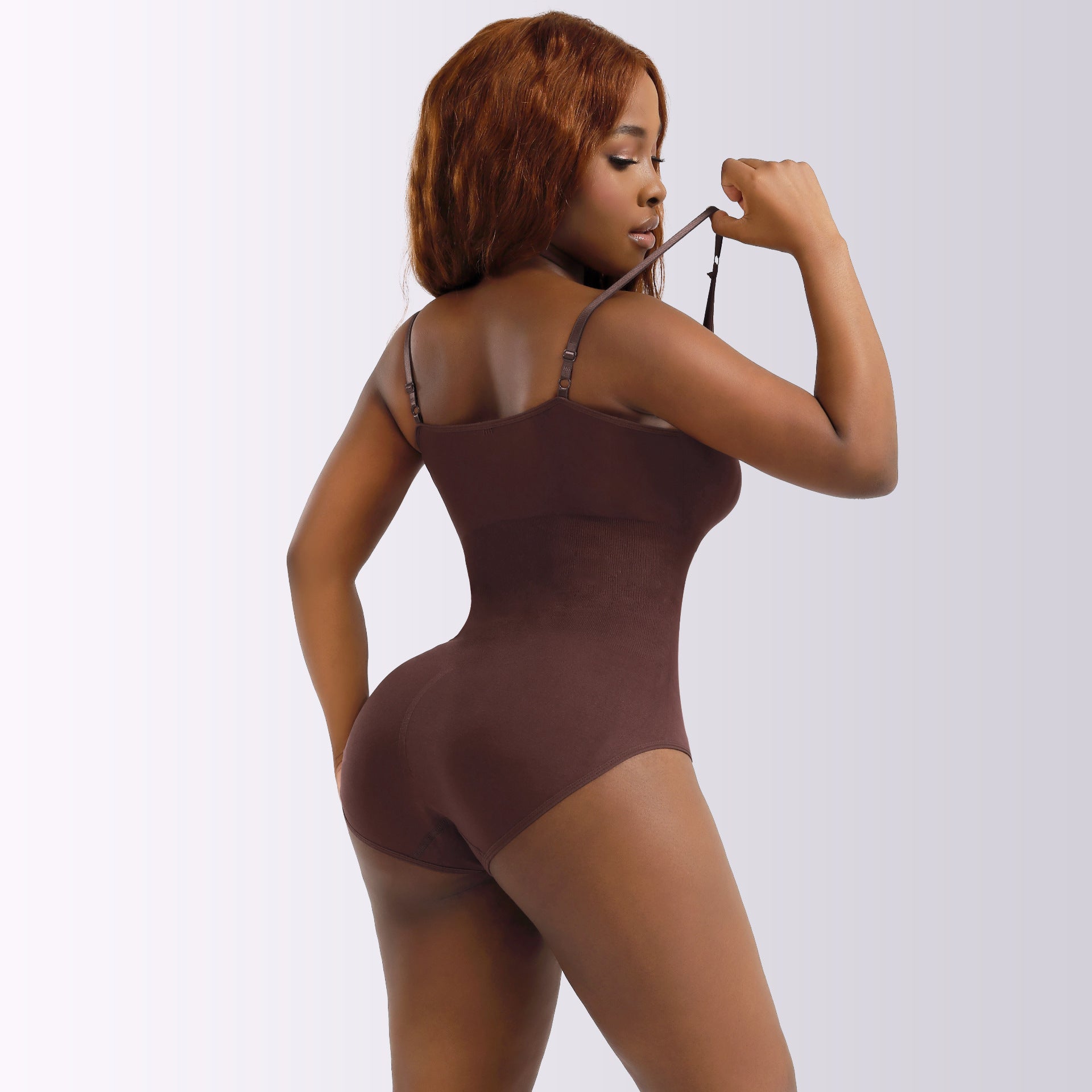 Focuses on "Premium Shapewear Bodysuit" and "Tummy Control"